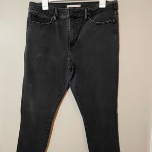 Levi'a 311 distressed black jeans